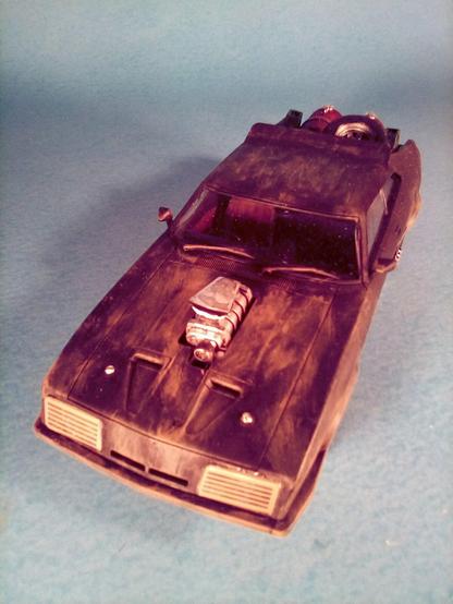 Picture of my 1/24 scale model kit of the Ford Interceptor used by Mad Max in the Mad Max films. I built and painted this model car.