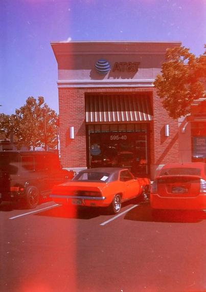 Another red car with accidental double exposure