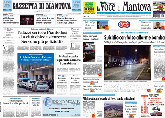 Questa è un'immagine di una pagina di giornale, che sembra unire due testate: "Gazzetta di Mantova" e "La Voce di Mantova". In evidenza c'è un titolo centrale che parla di un "suicidio con falso allarme bomba". Molti articoli riguardano fatti locali, come una lettera di un membro del Parlamento riguardo la sicurezza in città e la richiesta di più poliziotti. Ci sono fotografie piccole, tra cui una con alcune automobili e persone, probabilmente collegata alla notizia del falso allarme bomba. Sulla pagina sono presenti anche annunci pubblicitari e altre notizie di cronaca e politica locale.