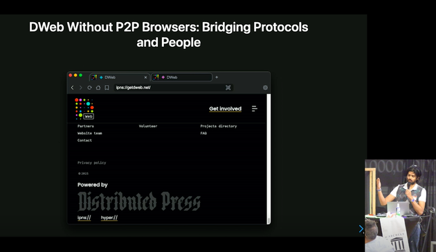 Presentation slide titled “DWeb Without P2P Browsers: Bridging Protocols and People” showing a screenshot of a browser window displaying the website "ipns://getdweb.net/". The site interface is dark-themed with links for getting involved, project directories, and more. At the bottom, it reads “Powered by Distributed Press” with protocol tags “ipns://” and “hyper://”. In the bottom-right corner, the presenter, Akhilesh Thite, is speaking at a podium with an Internet Archive banner.