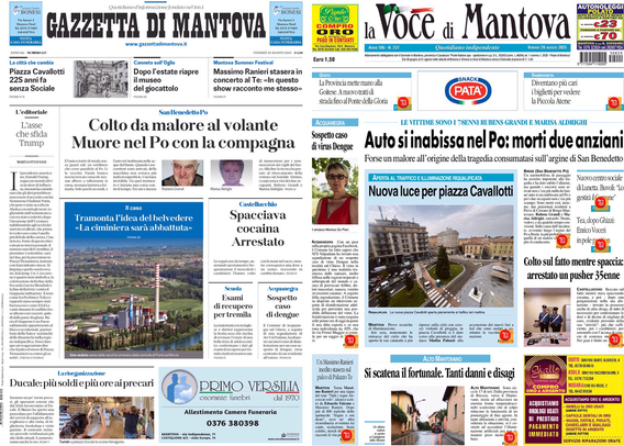 Il tablet mostra la prima pagina di due quotidiani affiancati: "Gazzetta di Mantova" a sinistra e "La Voce di Mantova" a destra. Entrambe le testate presentano notizie locali, con titoli principali dedicati a fatti di cronaca che coinvolgono incidenti e arresti nella zona di Mantova. La pagina è molto densa di testo, con alcune immagini e pubblicità sparse. 
