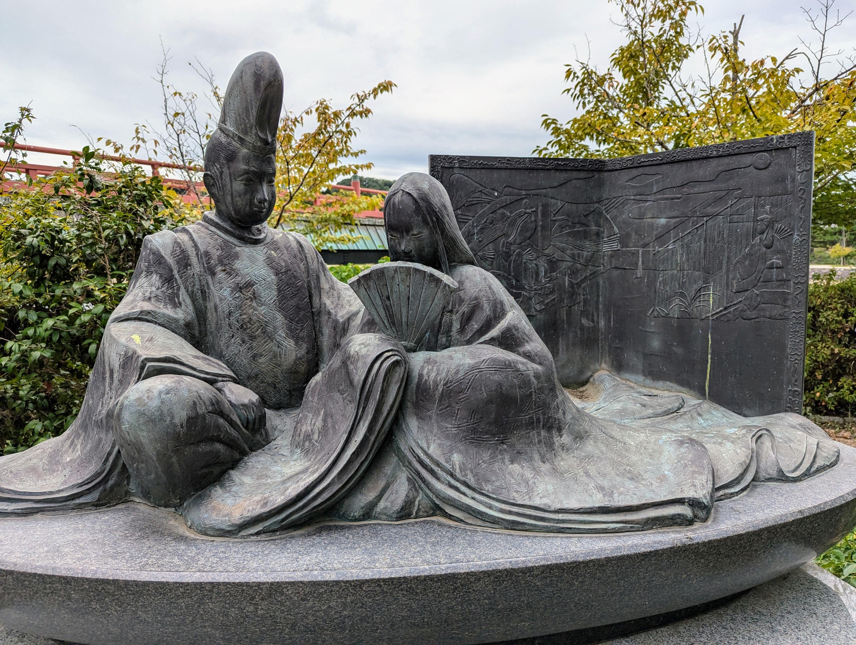 Tale of Genji monument by the banks of the Uji-gawa (depicting a couple in Heian period dress).