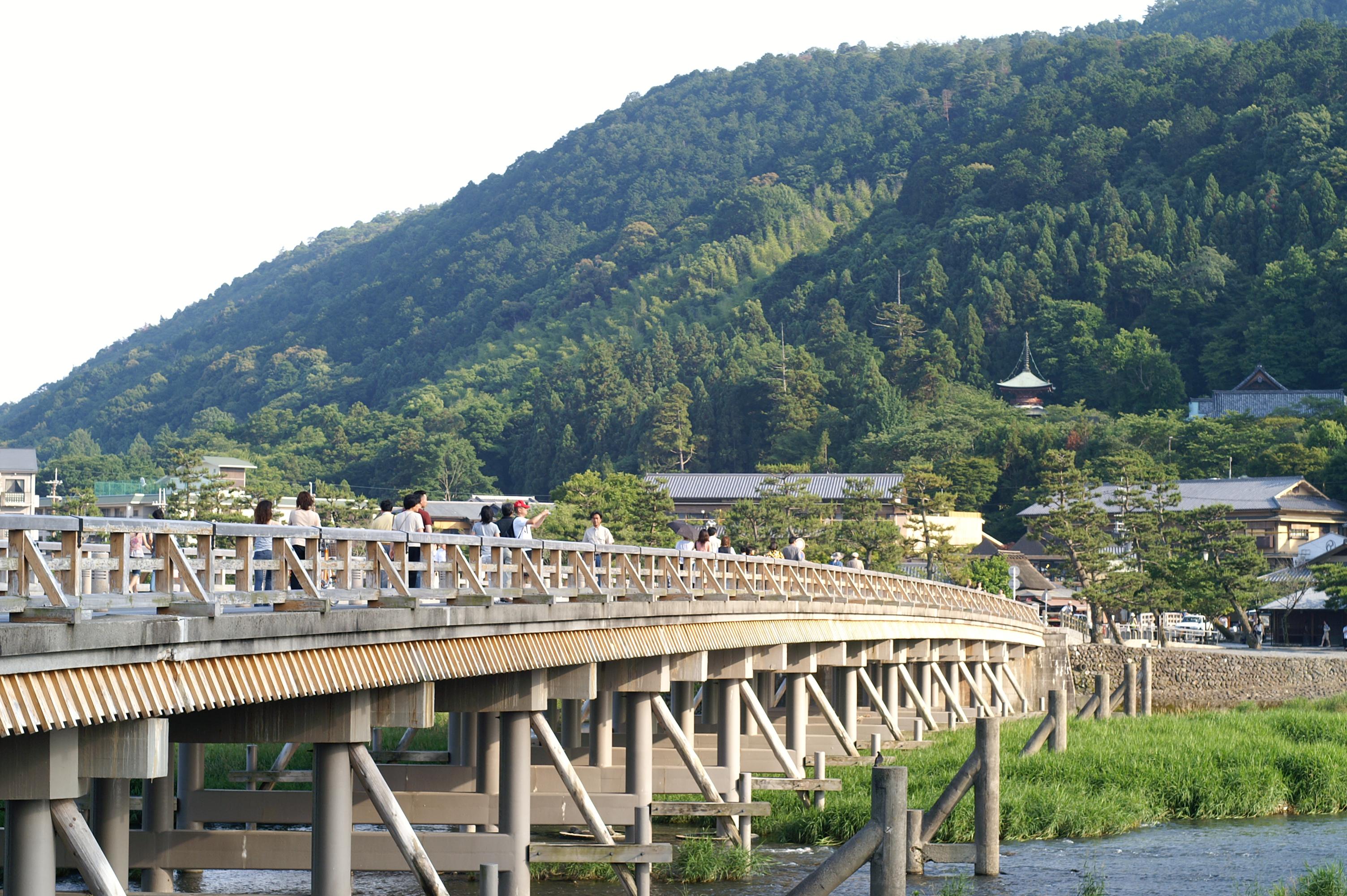 Looking across Togetsukyo Bridge to Horin-ji temple on the mountain slope above.