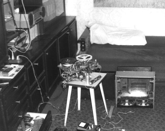 black and white picture from 1993 showing partially disassembled reel to reel tape recorder