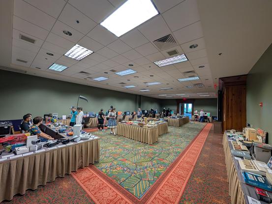 A room full of exhibits including interactive game stations