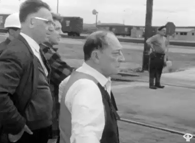 Buster Keaton in his old age, doing a gag with stopping and starting a train.