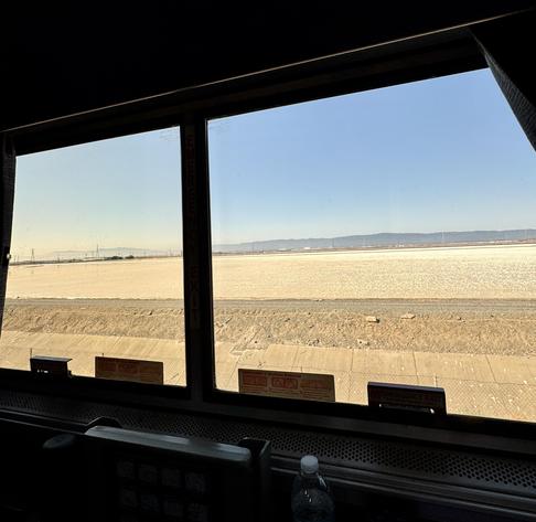 View out the window of the amtrak coast starlight, southbound. These are the salt beds in the southern San Francisco Bay.