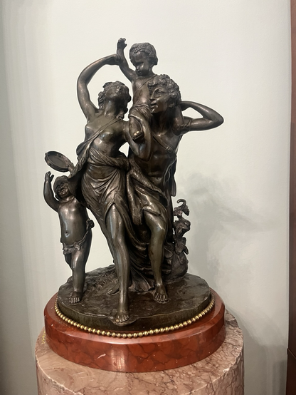 Bronze sculpture portraying Satyrs teaching their children to dance