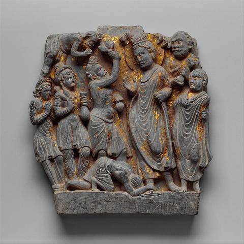 Gandharan relief depicting the ascetic Megha (Shakyamuni in a past life) prostrating before the past Buddha Dīpaṅkara and vowing to become a Buddha, c. 2nd century CE, Gandhara, Swat Valley, today Pakistan. Source: Wikimedia Commonsꜛ (license: CC 1.0)