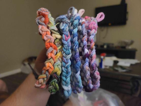 multiple different colored cotten suares made on a loom