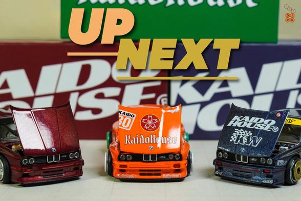 Three cars of BMW M3 E30, Kaido Works V1 by Mini GT in 1:64 scale on AREA 164