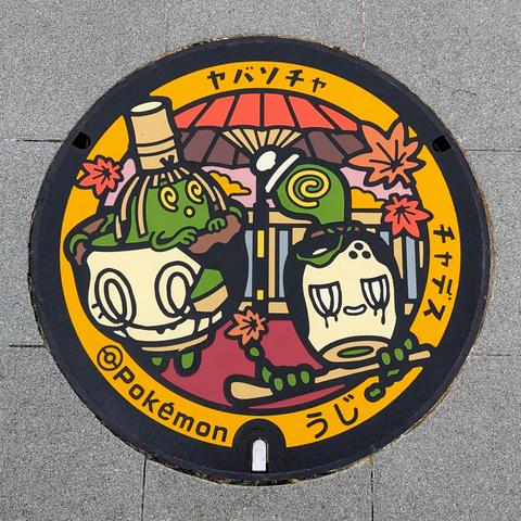 Poltchageist and Sinistcha manhole cover.