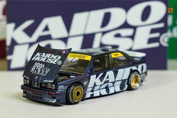 A left side of BMW M3 E30, Kaido Works V1 by Mini GT in 1:64 scale on AREA 164