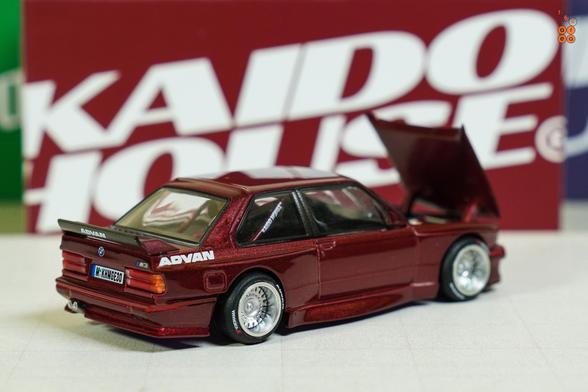 A right side of BMW M3 E30, Kaido Works GT V1, Calypso Red Metallic by Mini GT in 1:64 scale on AREA 164