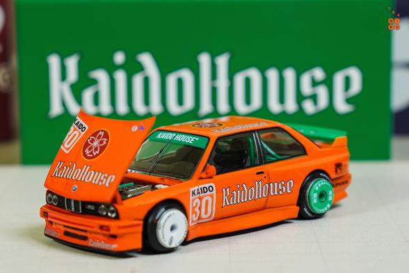 A left side of BMW M3 E30, KaidoHaus V1 by Mini GT in 1:64 scale on AREA 164