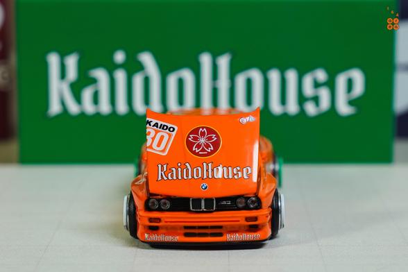A front side of BMW M3 E30, KaidoHaus V1 by Mini GT in 1:64 scale on AREA 164