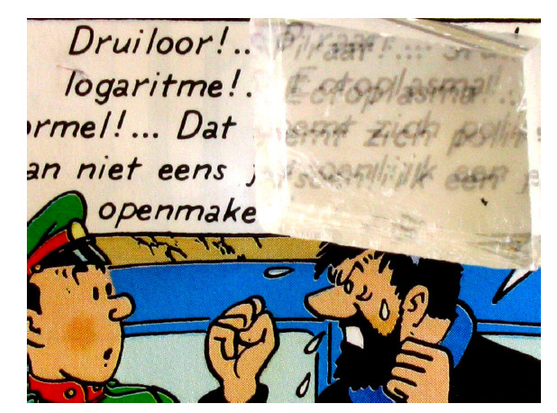 Calcite crystal on top of a cartoon image of a Tintin comic album, showing Captain Haddock. The text underneath the calcite crystal appears "doubled".