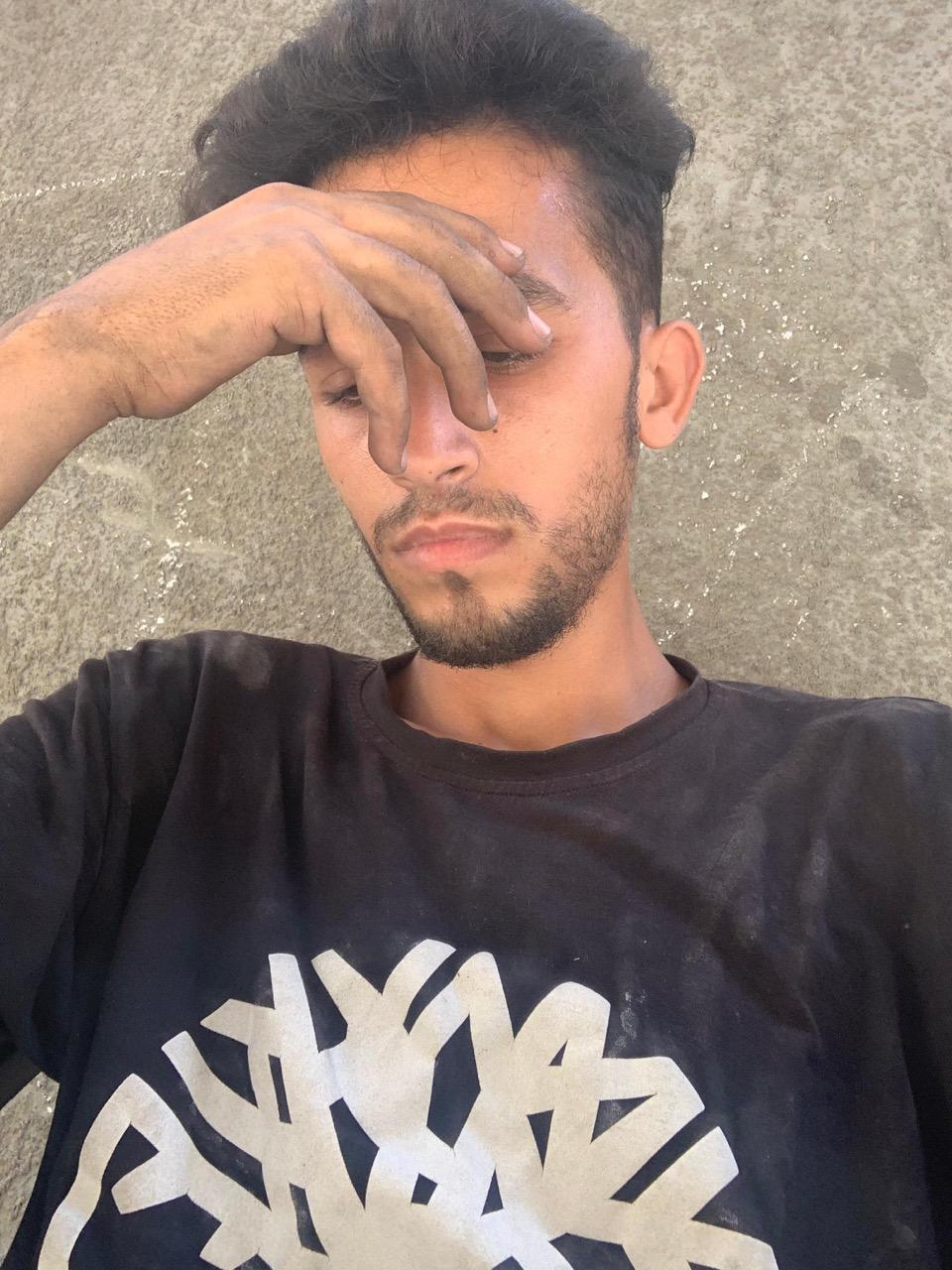 Mohammed Shobair, 22 years old, from Gaza, exhausted and numb.