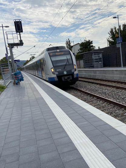 An S-Bahn train arriving at a station near Stuttgart