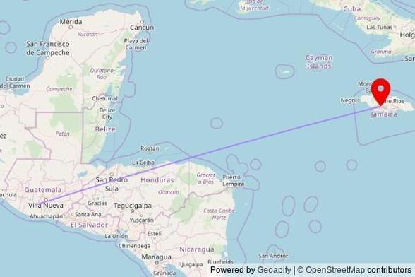 A map showing the great circle route from Santa Lucía Cotzumalguapa in Guatemala to a map pin at Saint Paul of the Cross Cathedral, 78 Manchester Road, Mandeville, Jamaica