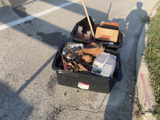 Two bins full of tools, nails, etc.