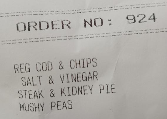 My chip shop ticket, waiting for a regular cod and chips, steak and kidney pie, and mushy peas