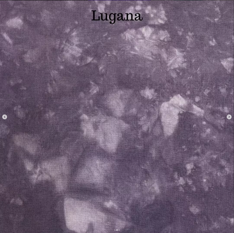 Lugana fabric dyed in a heavily marbled light grey-purple.