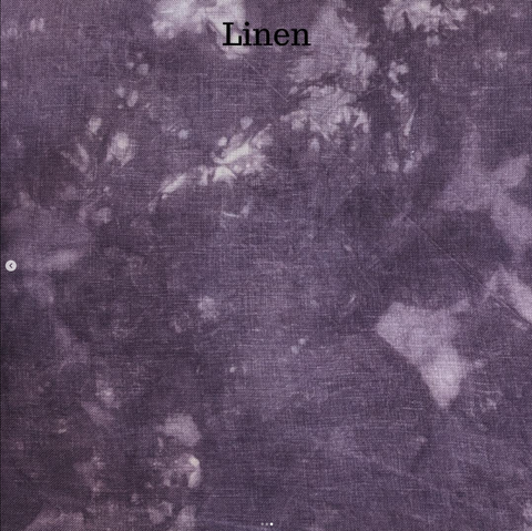 Linen fabric dyed in a heavily marbled light grey-purple.