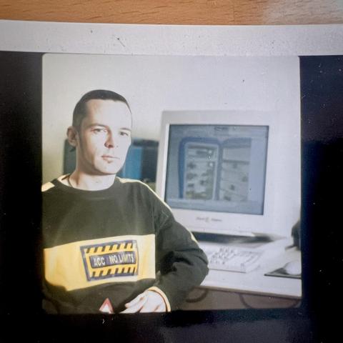 Me, 25 years younger, sit in front of my workstation, an Octane, with a 21” CRT.