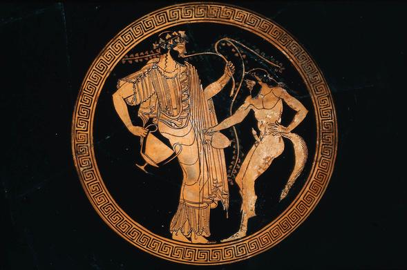 Dionysos holding a kantharos and a vine, and a satyr pouring from an oinochoë. At the left the inscription "The boy is handsome" (HO PAIS KALOS) can be read.
The whole scene is surrounded by a circle decorated with a meander.
The exterior is painted black without decoration.