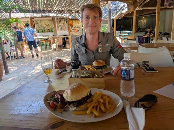 me with a burger in the restaurant at the vic falls national park
