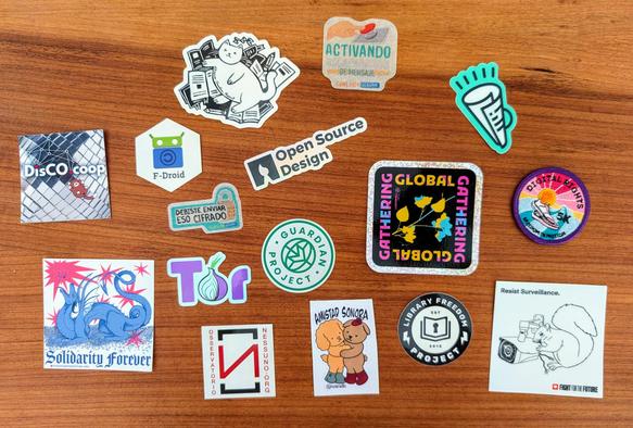 Photo of a collection of stickers of Global Gathering projects.