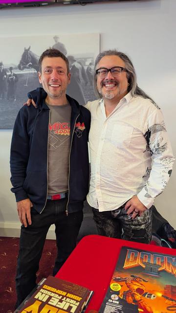 Publisher Jonah Naylor and FPS legend John Romero grinning for the camera at Liverpool Gaming Market