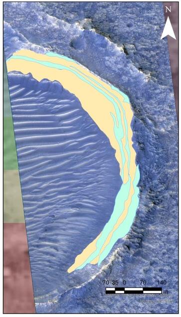An image of a crater in Oxia Planum, presented in false colour from the HiRISE camera on the Mars Reconnaissance Orbiter. The blue and oranges sections show multiple layers of clay units deposited in Oxia Planum and revealed at the crater wall. 

Image credit: Ananya Srivastava (University of Western Ontario)/NASA/HiRISE/University of Arizona.