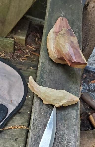 slightly more refined fishy and very rough duck on the arm of my (also redwood) outdoor bench