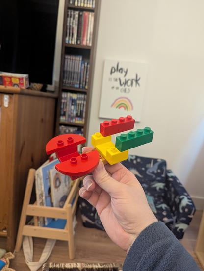 A vaguely Enterprise like ship made out of duplo, with a distinctly split saucer section