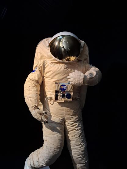 ESA astronaut against a black background