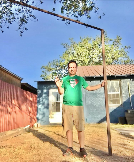 Aaron poses for his Mexican Independence Day picture while wearing a Super Mexico shirt.  Aaron se posa para su foto de Dia de Independencia Mexicana mientras trae puesto una camiseta de Súper México