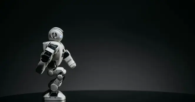 Humanoid robot maintaining perfect balance on one leg, demonstrating advanced fall-prevention algorithms