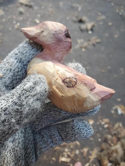 rough wooden duck is starting to have feather groups, and a bill shape that is more specific than "birdie"