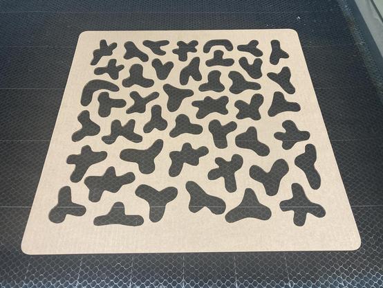 A cookie make from cardboard on a laser cutter.