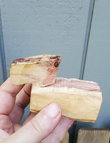Redwood carving block sawn into the most basic duck shape, with a square body and a slightly angled square head, like lego