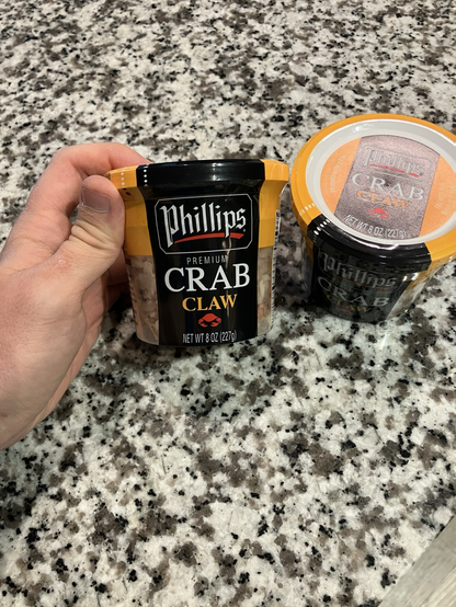 Two containers of Phillips Pasteurized Crab Claw.