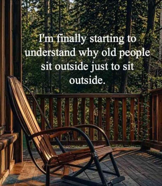 I'm finally starting to understand why old people sit outside just to sit outside.
A chair on the veranda of a cabin in a forest.