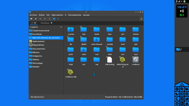 Captura de pantalla mostrando el explorador de archivos abierto, con un tema GTK oscuro con detalles en azul, y un juego de iconos también en azul.