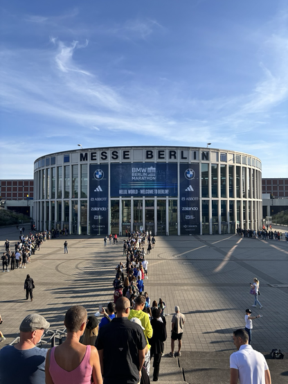 Long line of people in front of Messe Berlin