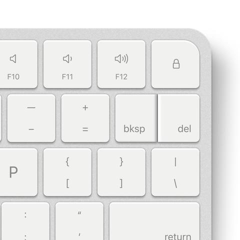 The top right corner of a magic keyboard but backspace has been split into two half-keys labeled bksp and del