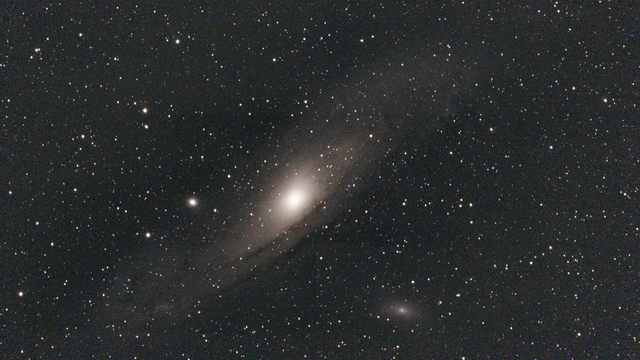 M31 Andromeda, M32 and M110 - unprocessed image.  M31 is the most distant object visible to the naked eye! It's on a collision course with the Milky Way, with its satellites, M32 and M110, in tow.