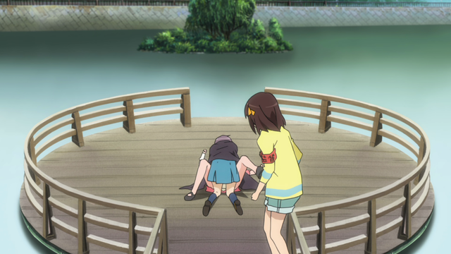 A girl (Haruhi) looking on at another girl (Yuki) who's pinning down another girl (Mikuru)