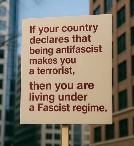 Sign, red lettering on a white background, in a city setting. The sign reads: 'If your country declares that being antifascist makes you a terrorist, then you are living under a fascist regime.'

Via: https://bsky.app/profile/mattnh.bsky.social